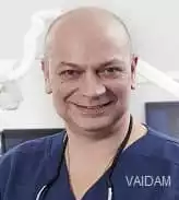 Dr. Can Tokman